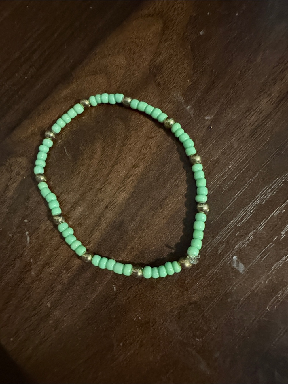 Green Beaded Stretch Bracelet with Gold Accents